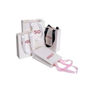 China Square Bottom Kraft Paper Gift Bags With Handles for Shopping and Cardboard Material wholesale