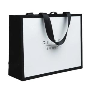 China Customized Logo Print Luxury White Shopping Paper Custom Cardboard Bags With Ribbon Handle wholesale
