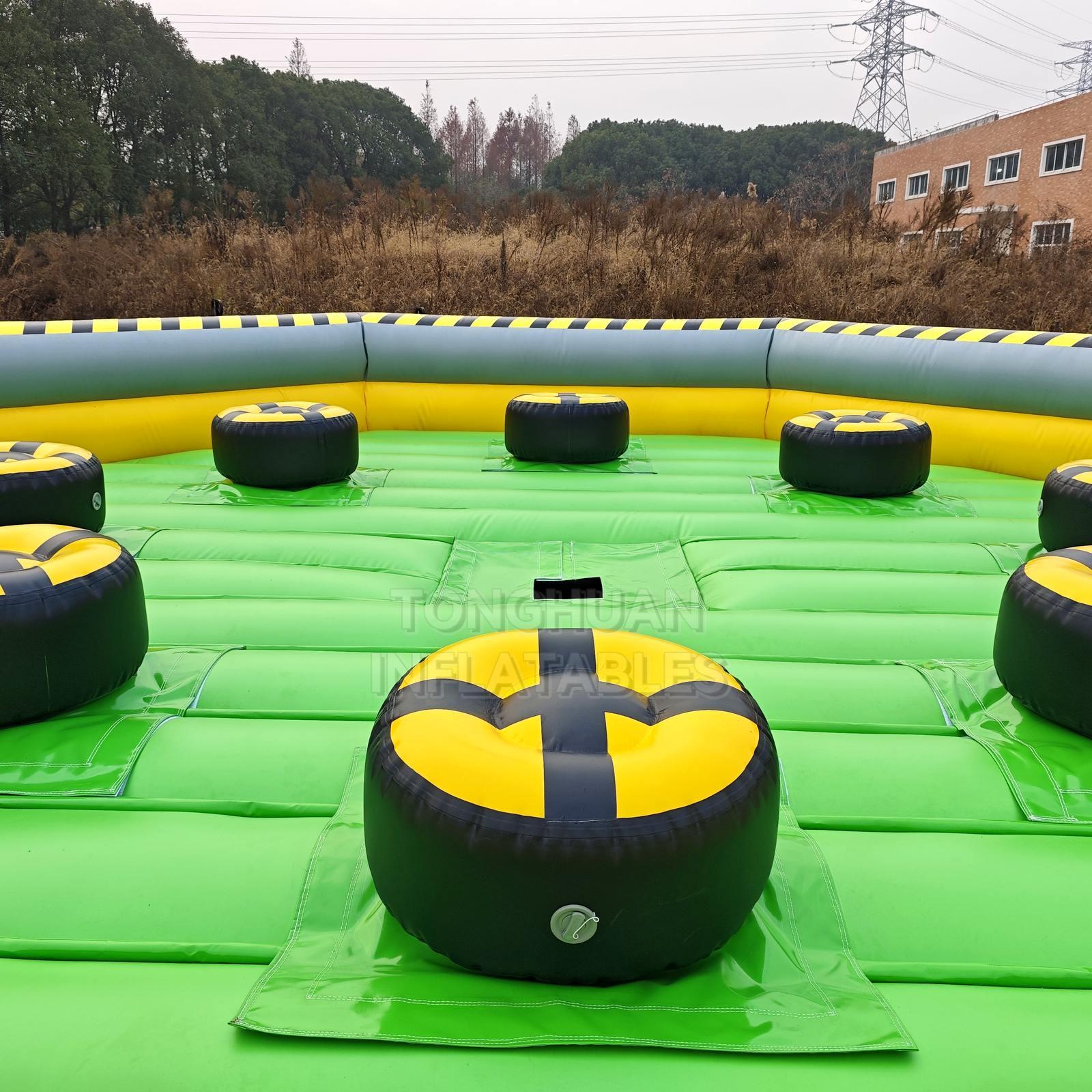 Commercial Inflatable Rotating Challenge Arena with Player Podiums and Safety Walls for Events Parks and Team Competition Games