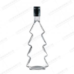 China Industrial Beverage Sealing Type Glass Lid 350ml Christmas Tree Shaped Glass Diffuser Bottle with Cork wholesale