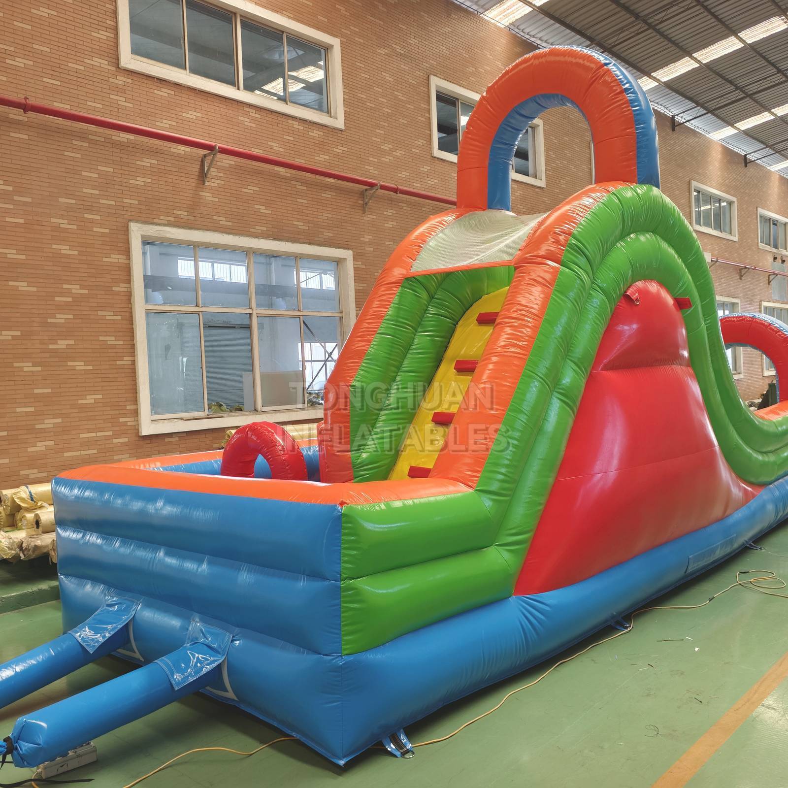 Colorful Compact Inflatable Obstacle Course with Entrance Arches Climbing Slide and Safety Mesh for Schools Events and Rental Business