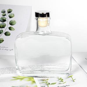 China Transparent 300ml 500ml Empty Glass Wine Bottles Embossing Electroplating wholesale