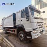 Sinotruk Howo 4X2 300 HP Euro II Right Drive Garbage Collector Compressed Truck