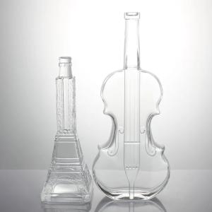 China Surface Handling Decal 500ml 750ml Round Extra Flint Whisky Vodka Brandy Glass Bottle wholesale