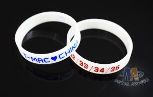 China Multi Colored Custom Plastic Bracelets Embossed Silicone Wristbands For Events wholesale