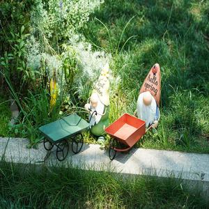 China Recycled Small Metal Garden Ornaments Gnome Pushing The Cart With Planter wholesale