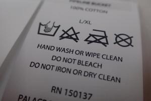 China Flat Cutting Custom Screen Printing Nylon Care Labels For Bags , Towels wholesale