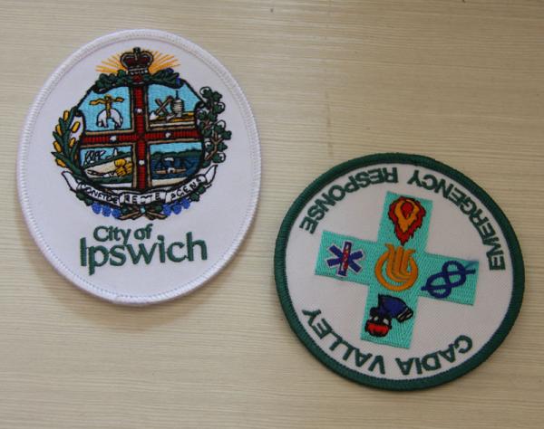 Quality Personalized Custom Embroidery Paches Merrow Edges Back Plain Fusing Paper Coated for sale