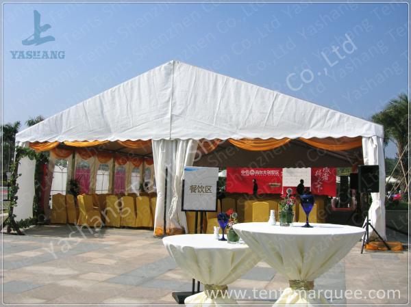 White Roof Cover outside event tents for Golf Villas Sales Conference with