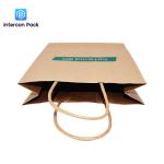 Shaped CMYK Printed Kraft Paper Bags With Handles And Logo Brown Color
