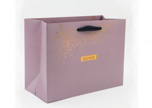 China Personalised gold hot stamping boutique paper bags with black ribbon handles wholesale