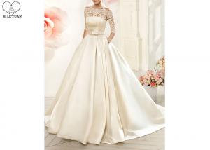China Cream Laces Satin Ball Gown Wedding Dress With Sleeves Back Zipper And Buttons wholesale