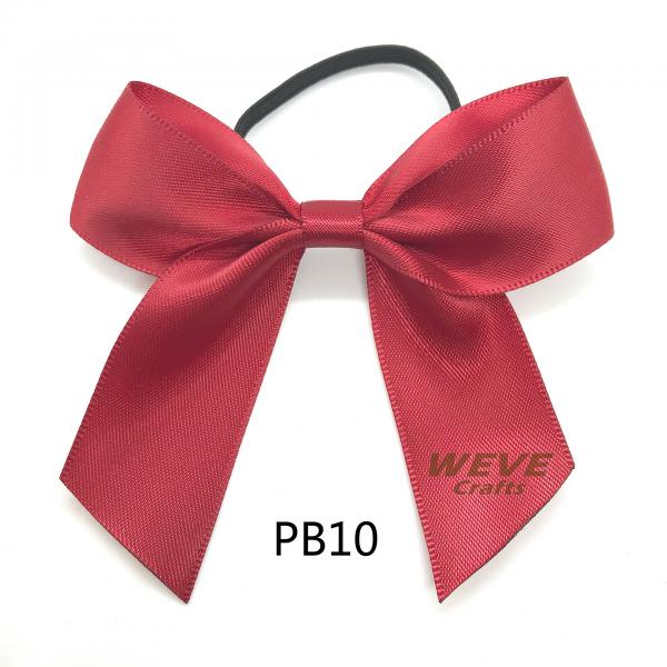 Quality Christmas packing bow with elastic band on back for sale