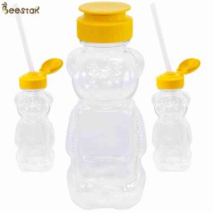 China Wholesale High Quality 300g Honey Jar And Spoon Plastic Empty Honey Bear Bottles wholesale