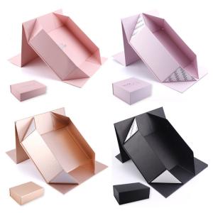 China Personalized Rigid Magnetic Foldable Gift Box Cardboard Packaging Box With Ribbon wholesale