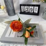 Decorative flowers with artificial rose ornaments
