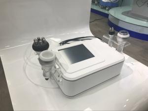 China 4 in1 rf 40K hz Cavitation Slimming machine vacuum rf roller+tripolar rf+cavitation Machine wholesale