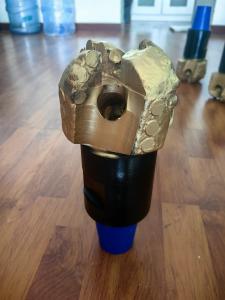 China 127mm Pdc Rock Drill Bit 4 Blade With 2 3/8 REG Hard Facing Steel Body wholesale