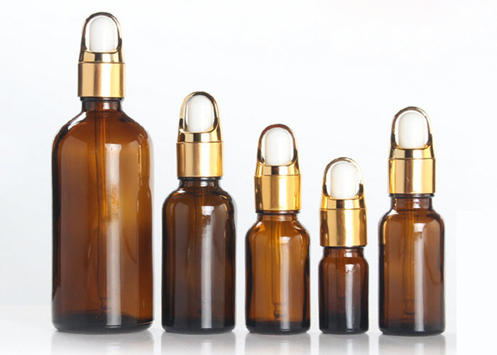 Fancy Amber Cosmetic Bottles Round Shape Customized Logo Printing