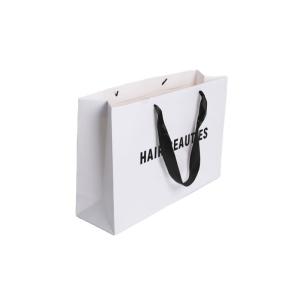 China Ribbon Handle Ivory Board Paper Bags With Custom Logo For Handmade Clothing Packaging wholesale