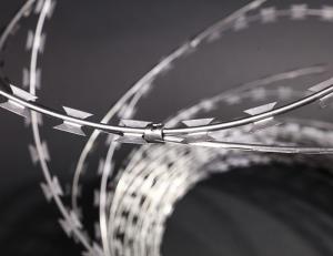 China Anti Climbing Fencing Hot-dipped Galvanized 200 GSM Cross Concertina Razor Wire Loops wholesale