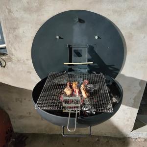 China Rustic 80cm Wood Burning Fire Pits Wall Mounted Barbecue Grill Corten Steel Wall Hanging Grill wholesale
