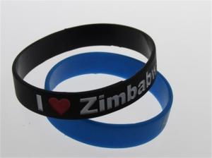 China black two colors filled custom silicone wristband debossed and painted bracelet on sale