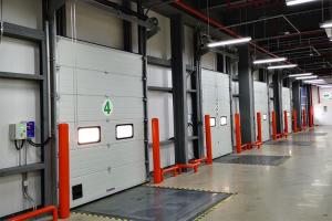 China High Speed Roller Exterior Industrial Sectional Overhead Doors wholesale