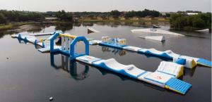 China OEM Inflatable Floating Water Park Obstacle Course Jumping Sport Game wholesale
