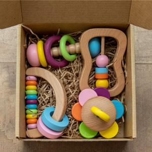 China Rattle Soother 11.6cm Wooden Teething Toy Wooden Rattle Teether Food Grade wholesale