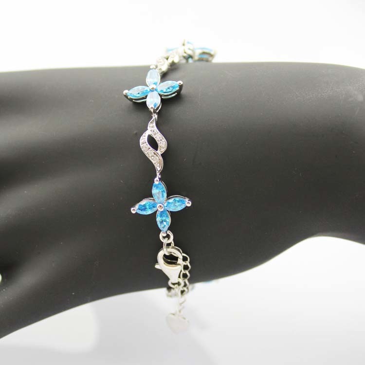 925 Silver Jewellery Quatrefoil Blue Topaz Cubic Zircon Tennis Bracelet (B04BLUE)