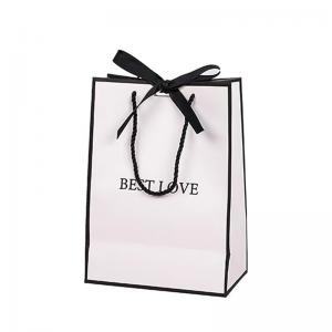 China 140gsm Contrast Color Black White Paper Gift Bag With Herringbone Handle on sale