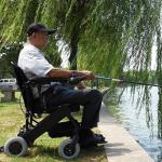 Brushless Motor ISO13485 18 KG 30KM Aluminium Folding Wheelchair