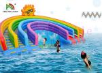 Anti - UV Inflatable Water Parks Triple Lanes PVC Rainbow Slide With Swimming