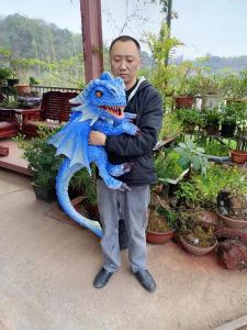 China Hot Sale Kids Attractive Dinosaur Hand Puppet Simulation Baby Dinosaur Puppet Model wholesale