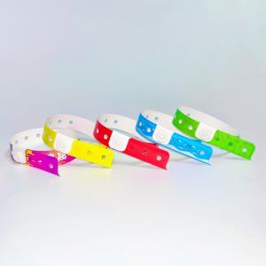 China Custom Promotion Waterproof Vinyl PVC Wristbands L Shape One Layer PVC Waterproof Colorful Paper Wristband wholesale