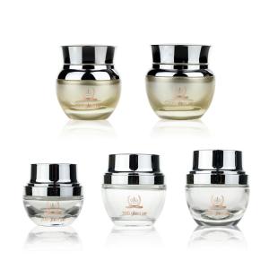 China Cosmetic 50g Glass Jar Packaging Empty With Silver Screwing Cap wholesale
