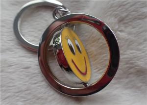 China Color Silver Key Chain Personalized Promotional Gifts With Rotatable Smiling Yellow Face wholesale