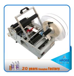 China Semi automatic red wine labeling machine cosmetics vial labeling wholesale