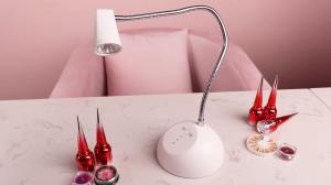 China OEM USB Charging UV LED Lamp 48w Low Heat Nail Dryer Lamp 360 Degree Rotatable wholesale