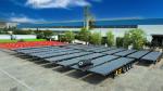 Versatile and 3-Axle Drop Side Rail Wall Flatbed Semi-Trailer for Heavy Cargo