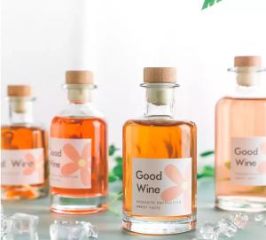 China 200ml 375ml 500ml 750ml Round Glass Liquor Wine Vodka Tequila Bottle with Sealed Cork Lid wholesale