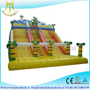 China Hansel attractive kids amusement park games inflatable climbing wall with slide wholesale