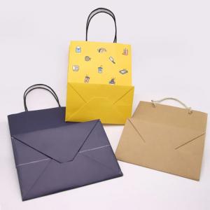 China Kraft Paper Packaging Bag Gift Crafts Shopping Biodegradable Bag With Twisted Handle wholesale