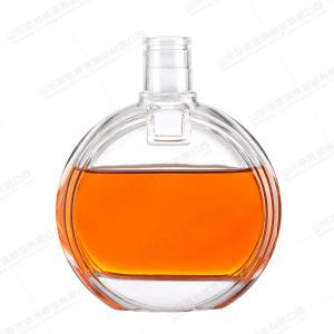 China 350ml 500ml 700ml Round Glass Liquor Decanter with Hot Stamping and Engraved Glass Lid wholesale