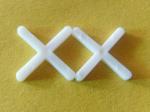 Ceramic tile locating plastic crosses