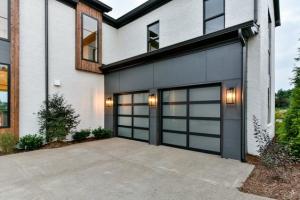 China Black Automatic Garage Door Electric Sectional 0.76PVB Fluorocarbon Paint wholesale