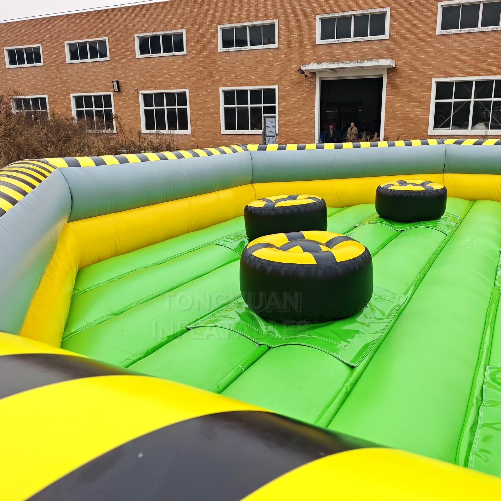 Commercial Inflatable Rotating Challenge Arena with Player Podiums and Safety Walls for Events Parks and Team Competition Games
