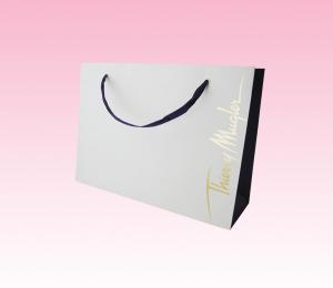 China custom ODM paper shopping bag suppliers with eyelet black cotton rope on sale