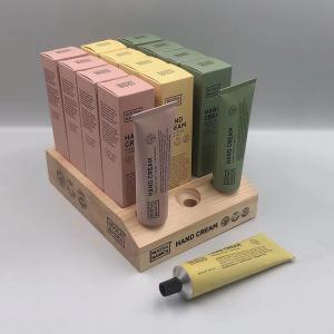 China Cosmetic Store Wood Display Holder Hand Cream Display Stand wholesale
